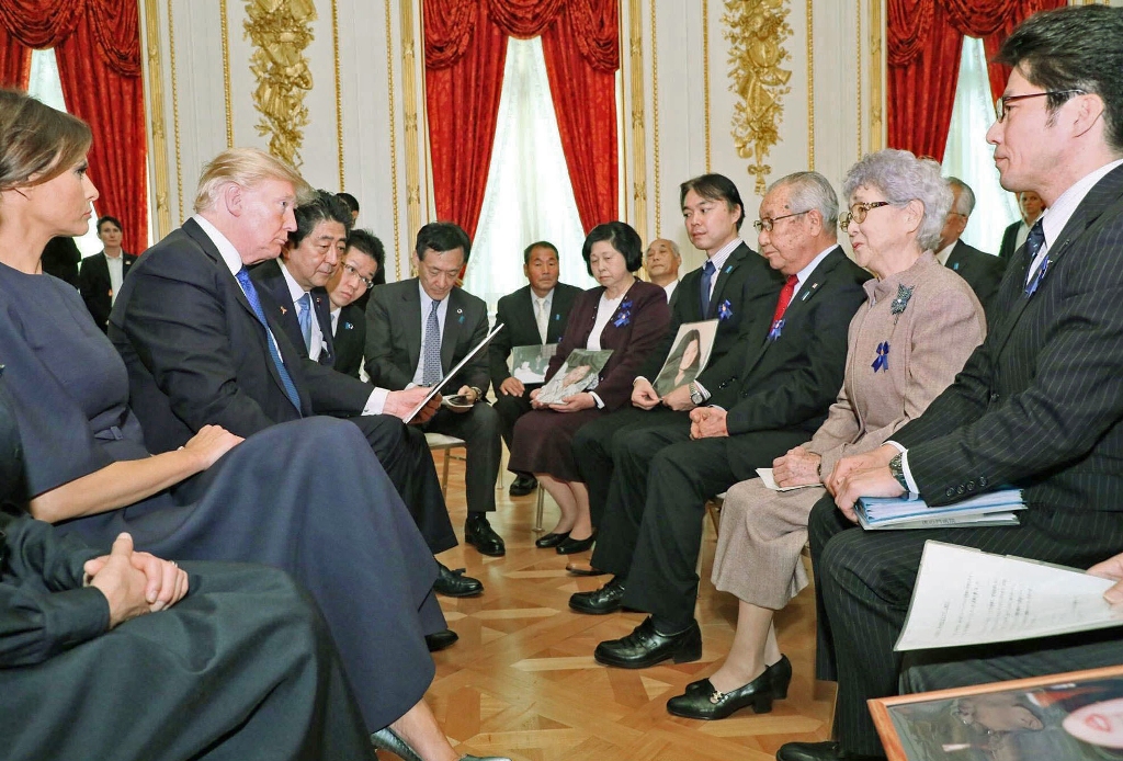 President Donald Trump and the family members of abductees.